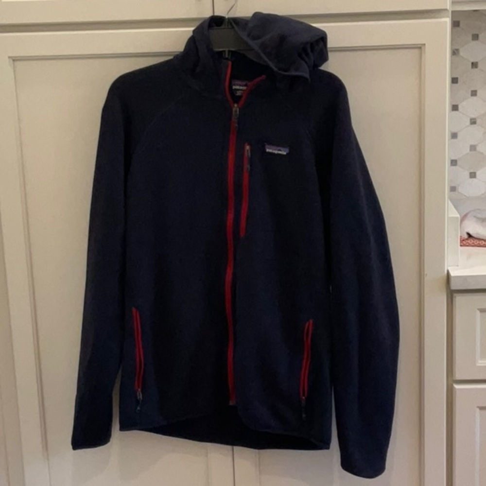 Patagonia jacket size large.  Navy with red